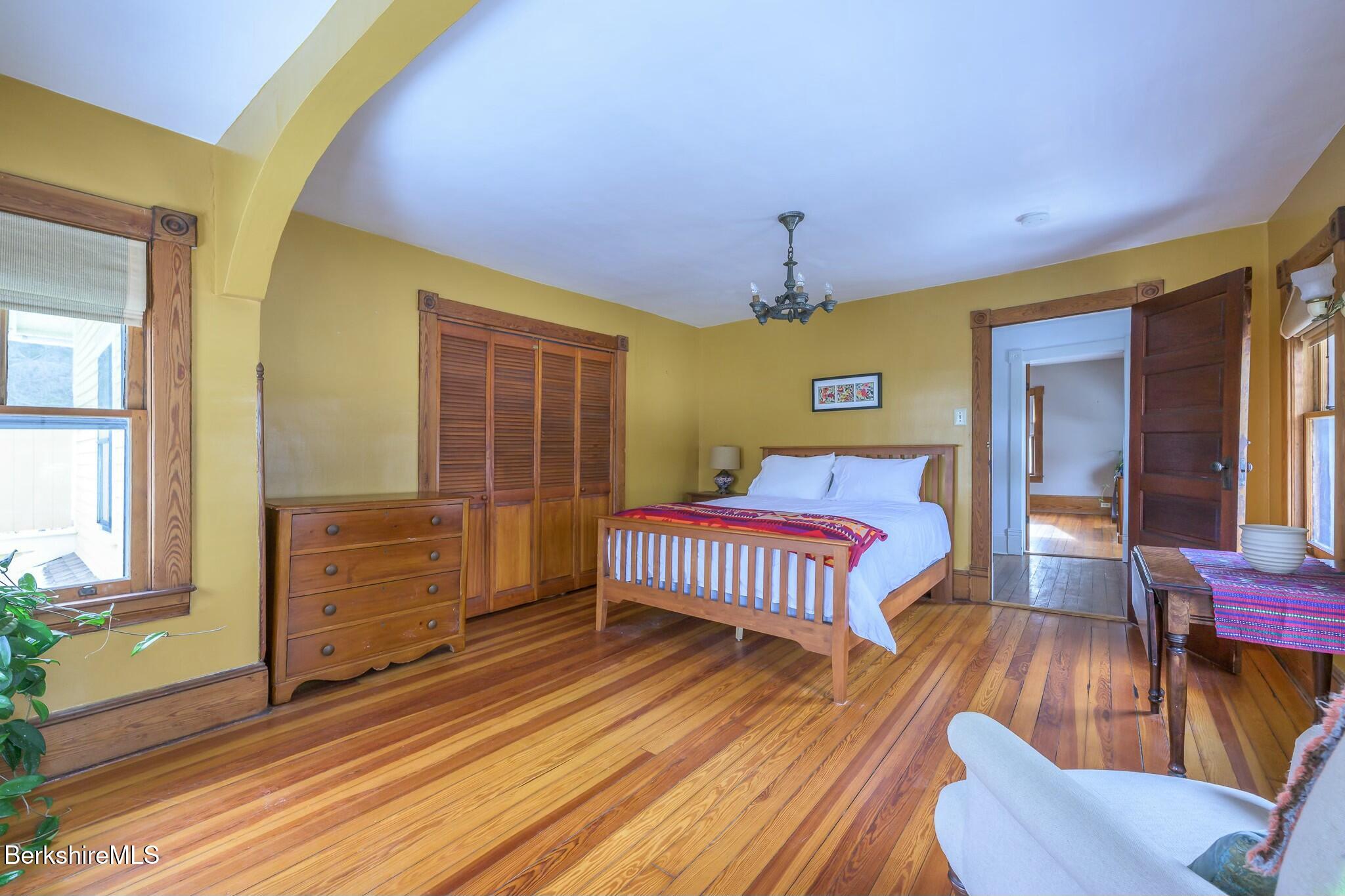 5 Stockbridge Road West Stockbridge, MA 01266 - Photo 30 of 60 a bedroom with a bed and wooden floor