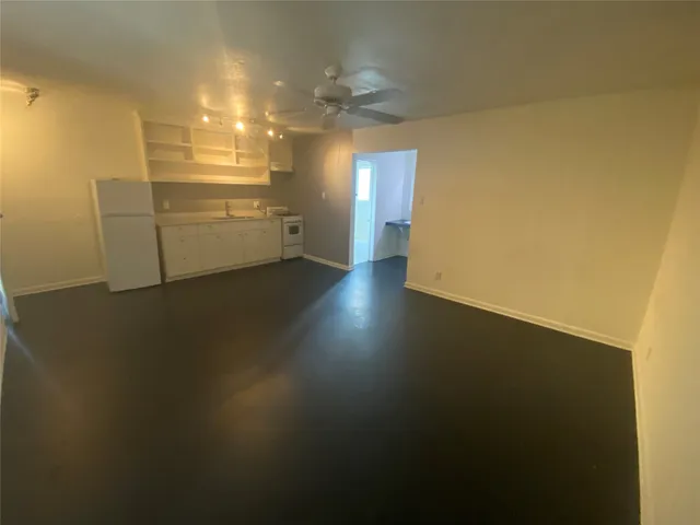 a view of a room with storage and utility room