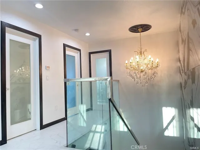 a view of a livingroom from a hallway