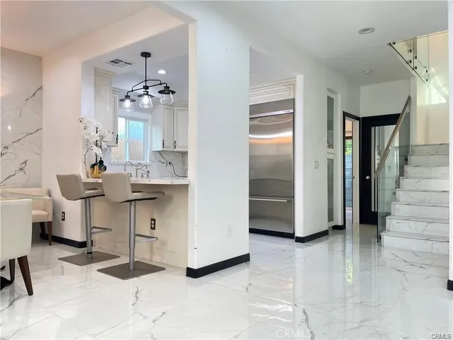 a room with cabinets and a table