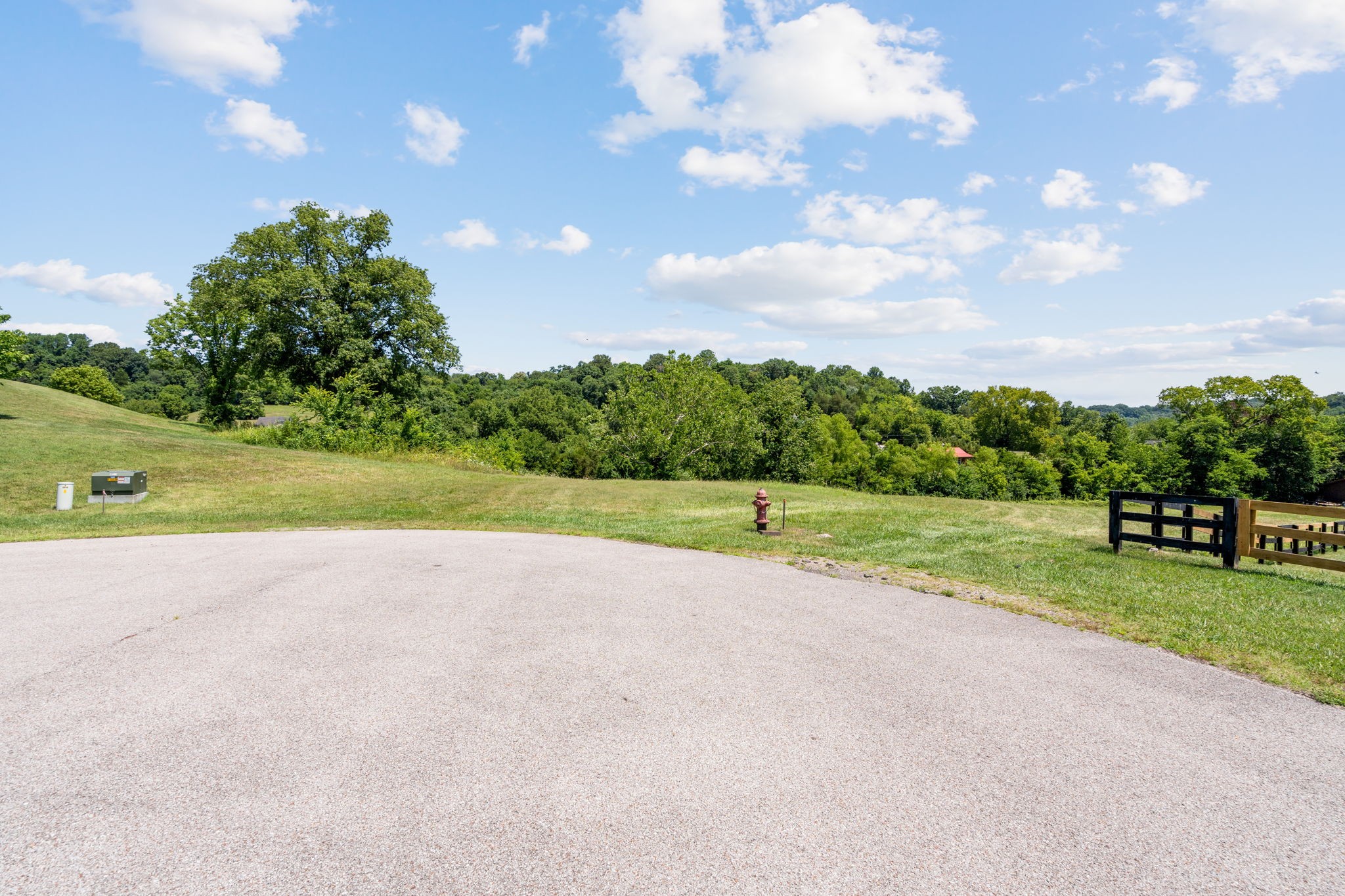 1711 Joe Pope Road Thompson's Station, TN 37179 - Photo 6 of 14 a view of a golf course with a park