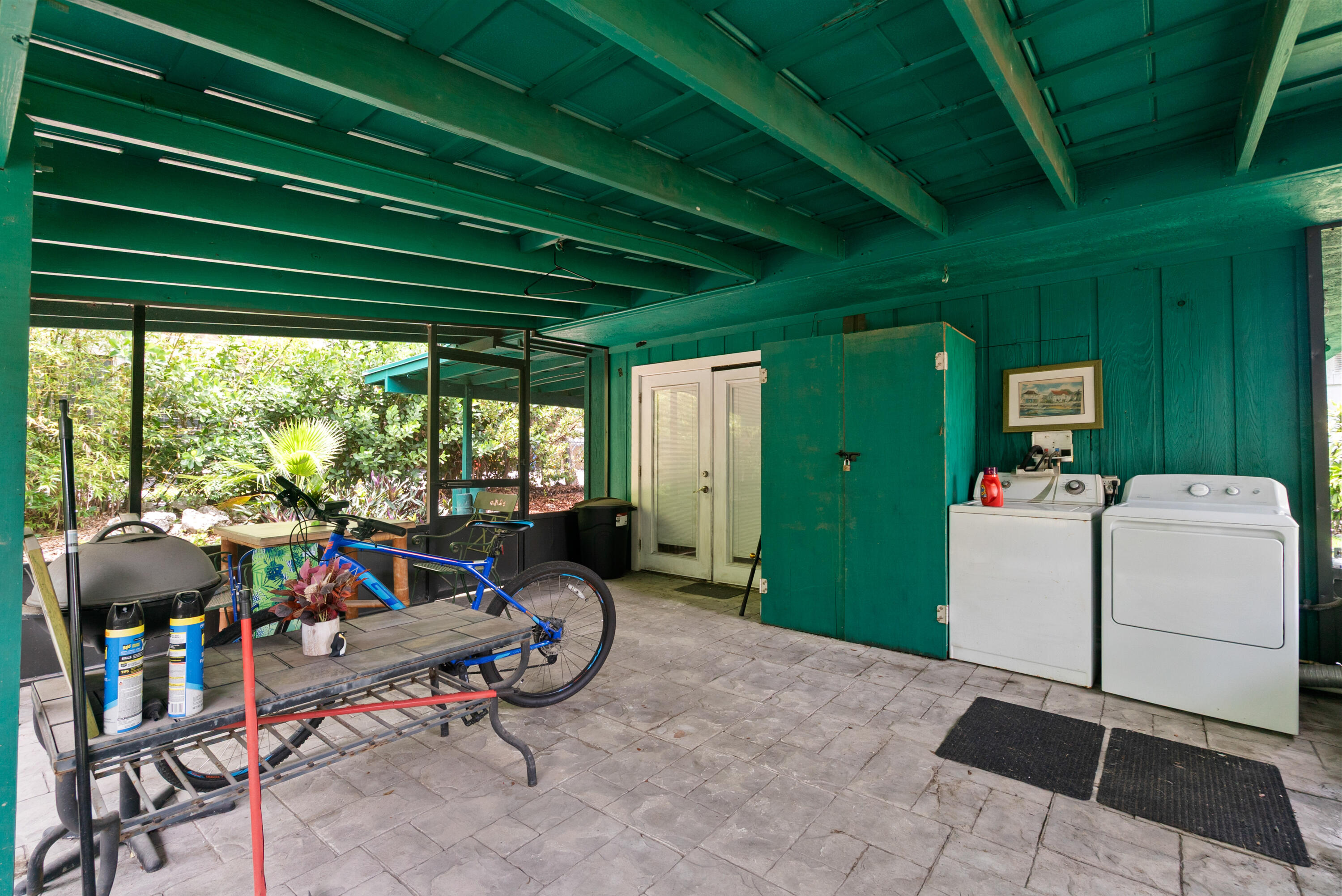 227 Atlantic Boulevard Key Largo, FL 33037 - Photo 24 of 35 Screened in porch from storage building