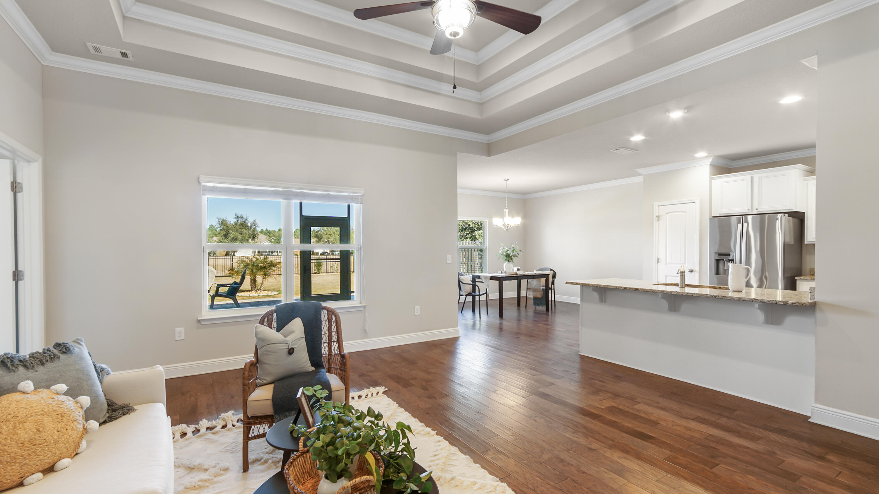 96 Mary Ellen Way Freeport, FL 32439 - Photo 12 of 69 a living room with furniture and a chandelier