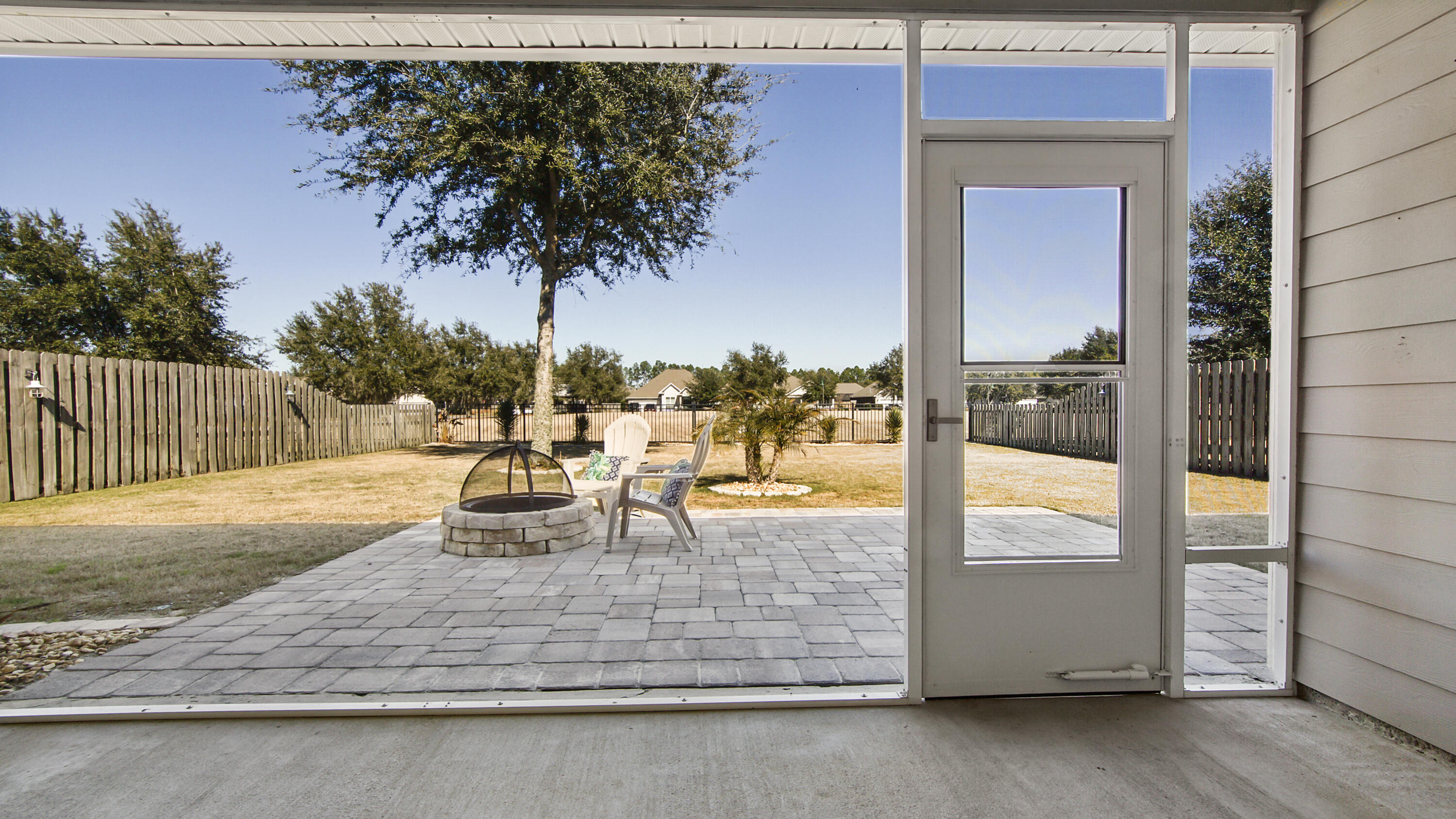 96 Mary Ellen Way Freeport, FL 32439 - Photo 21 of 69 a view of a swimming pool with a lounge chair