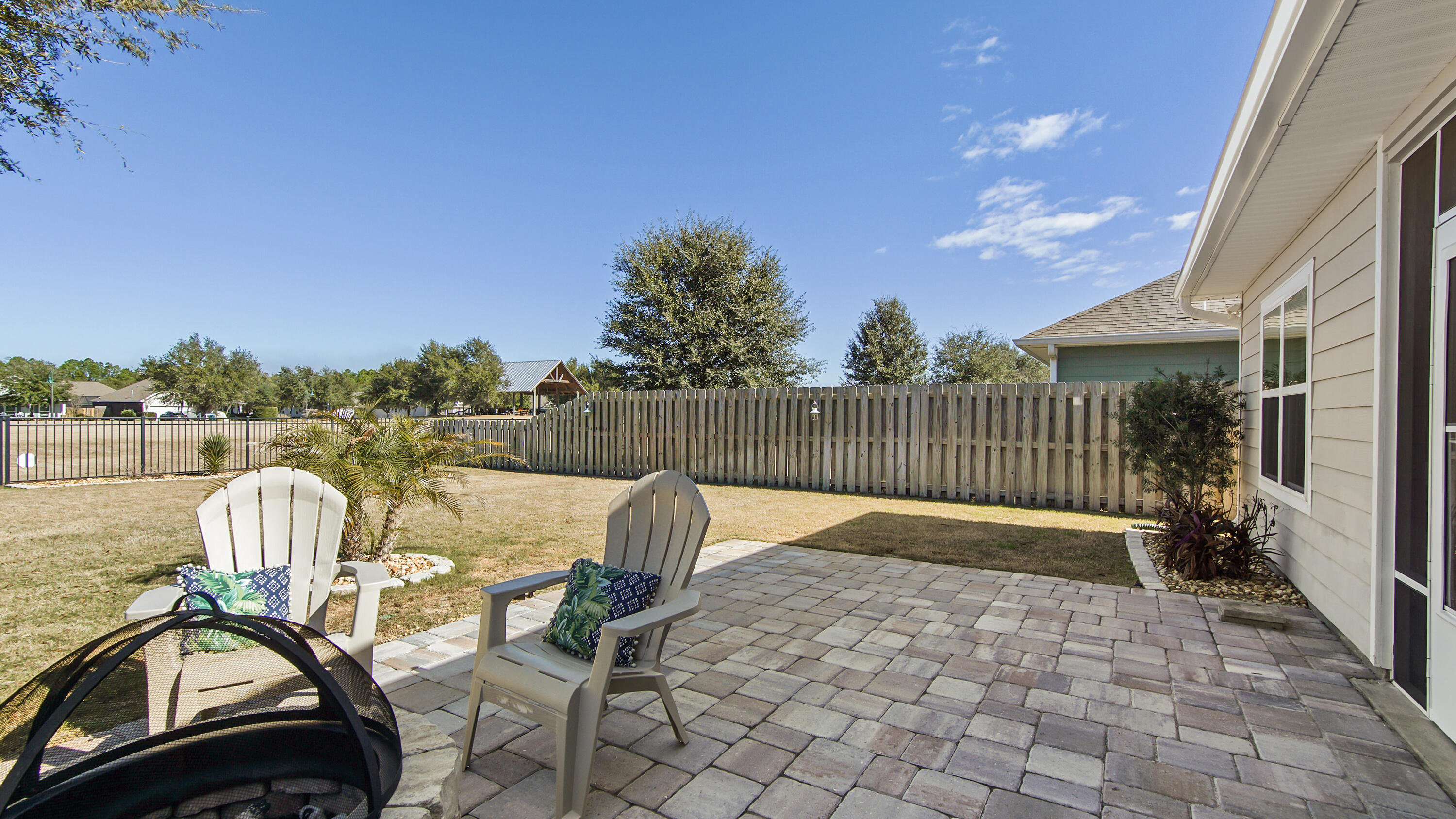 96 Mary Ellen Way Freeport, FL 32439 - Photo 25 of 69 a view of a chair and table on the terrace