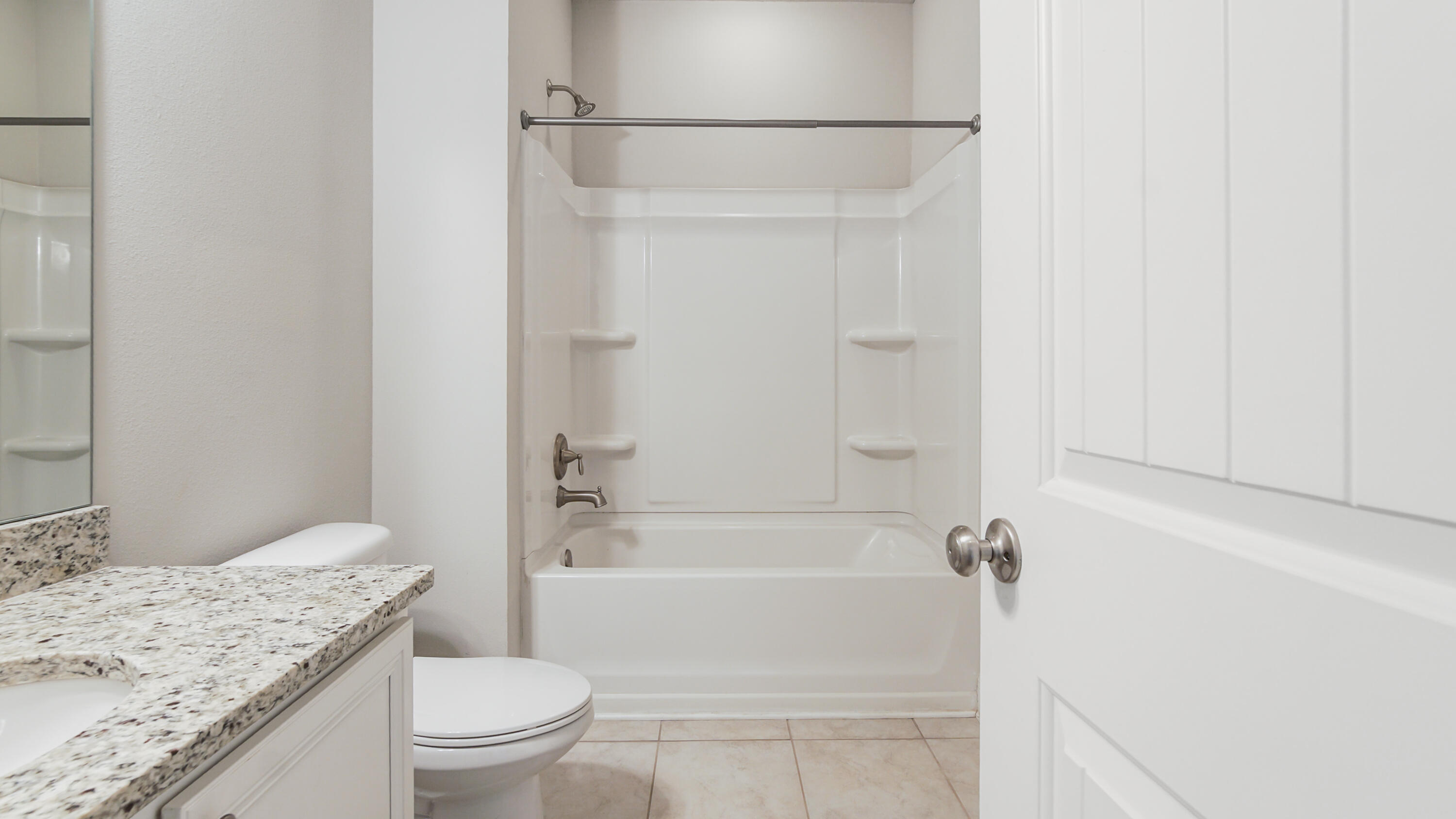 96 Mary Ellen Way Freeport, FL 32439 - Photo 40 of 69 a bathroom with a granite countertop sink toilet and shower