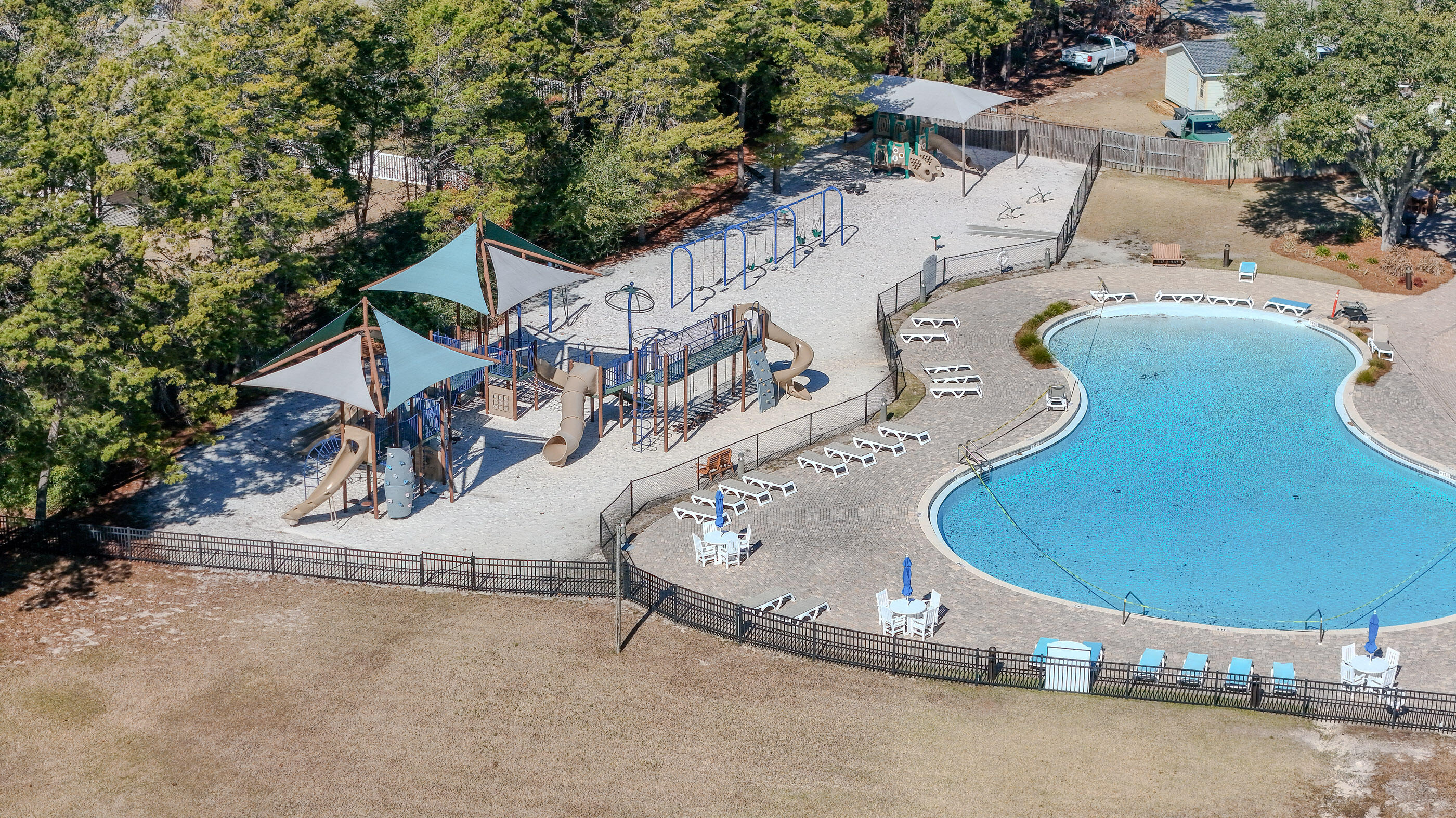 96 Mary Ellen Way Freeport, FL 32439 - Photo 60 of 69 an aerial view of a swimming pool and patio