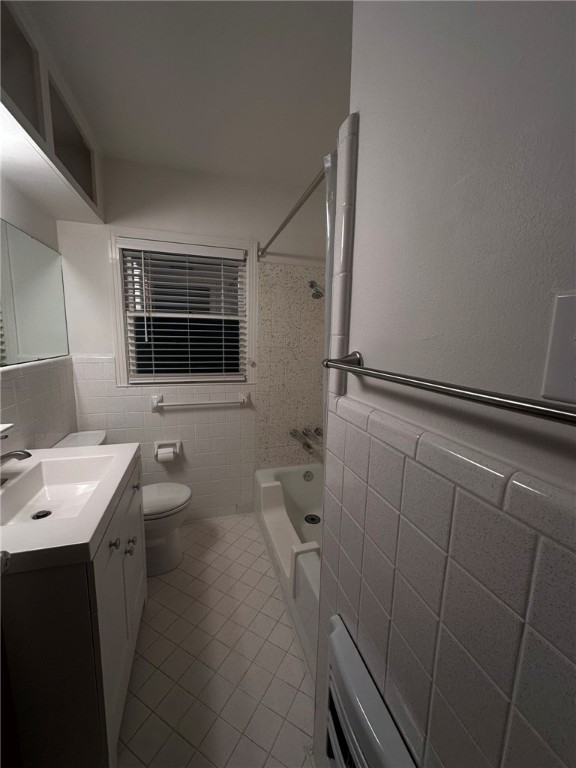 4002 Lowman Street Corpus Christi, TX 78411 - Photo 13 of 18 a bathroom with a sink a toilet and shower