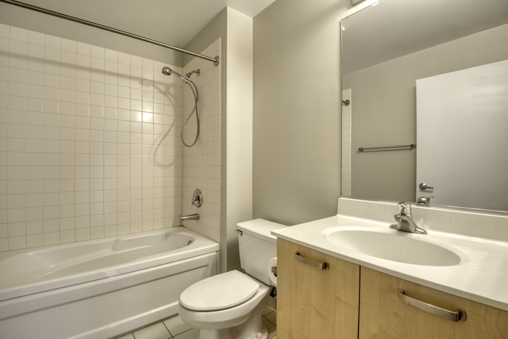 111 South Morgan Street, Unit 518 Chicago, IL 60607 - Photo 15 of 18 a bathroom with a sink toilet vanity and shower