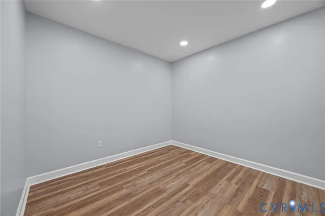 a view of kitchen with furniture and wooden floor