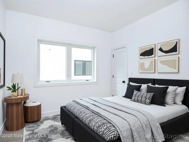 a large kitchen with stainless steel appliances granite countertop a sink a stove a refrigerator and a cabinets