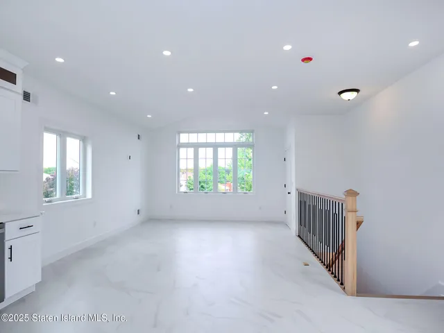 a bedroom with a bed and furniture