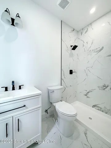 a picture of a room with a floor to ceiling window