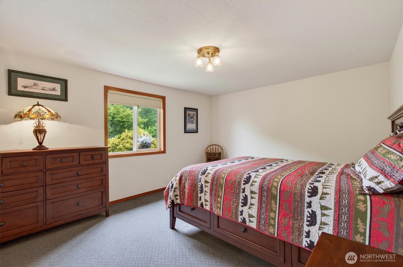 218 West Sunny Sands Road Cathlamet, WA 98612 - Photo 17 of 40 a bedroom with a bed and a window