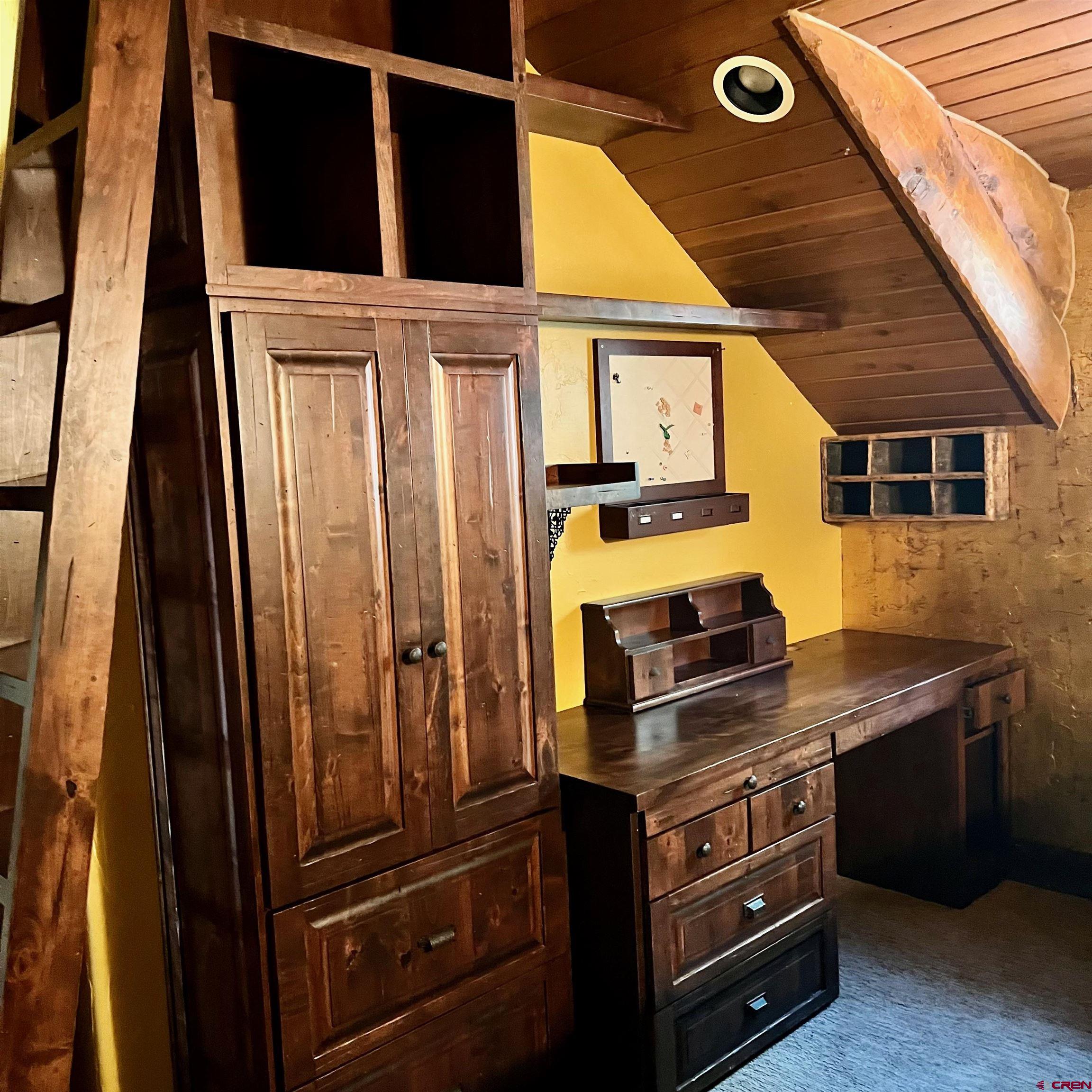 202 Lower Allen Road Crested Butte, CO 81224 - Photo 11 of 21 a kitchen with stainless steel appliances granite countertop a stove and a refrigerator