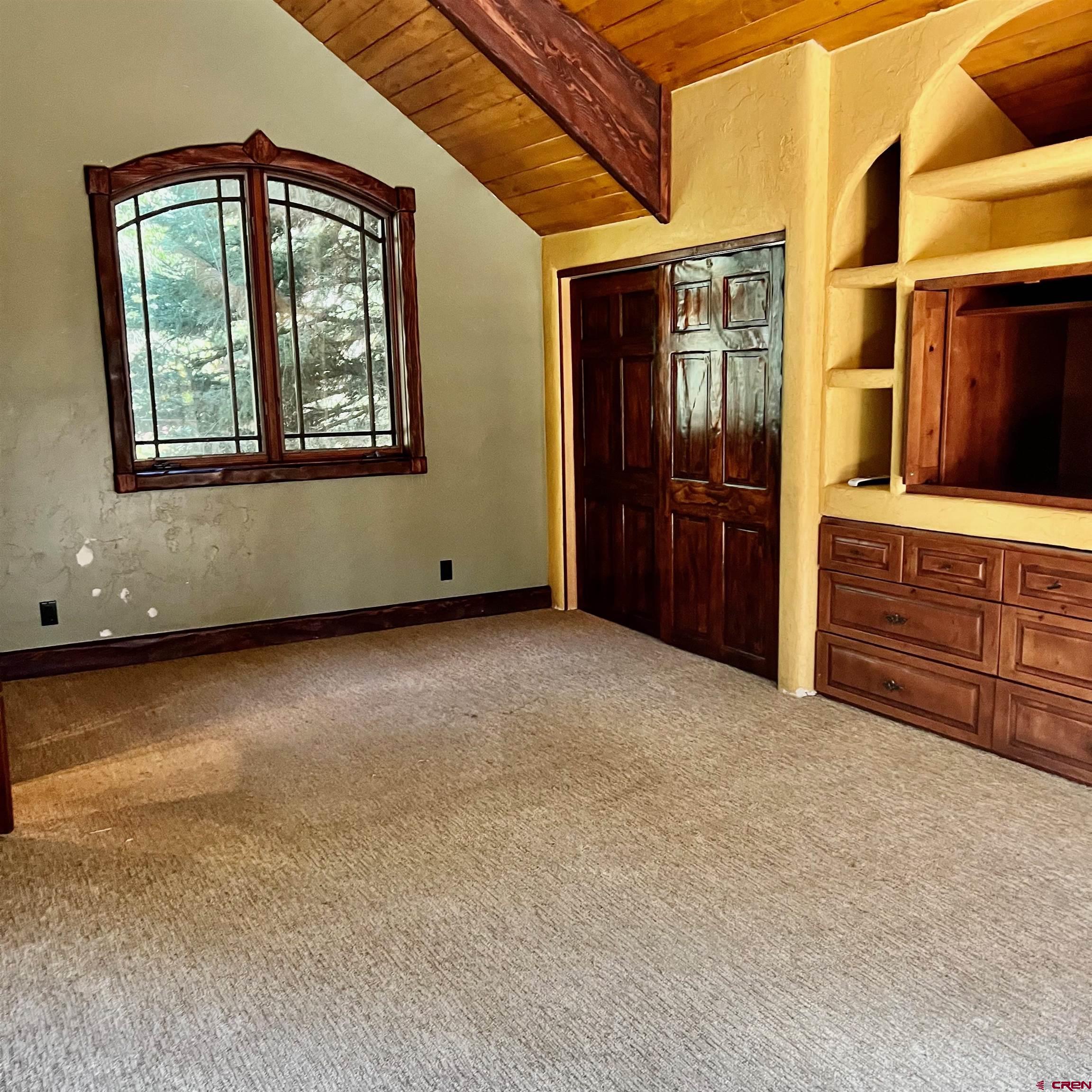 202 Lower Allen Road Crested Butte, CO 81224 - Photo 12 of 21 a view of an empty room with window and cabinet