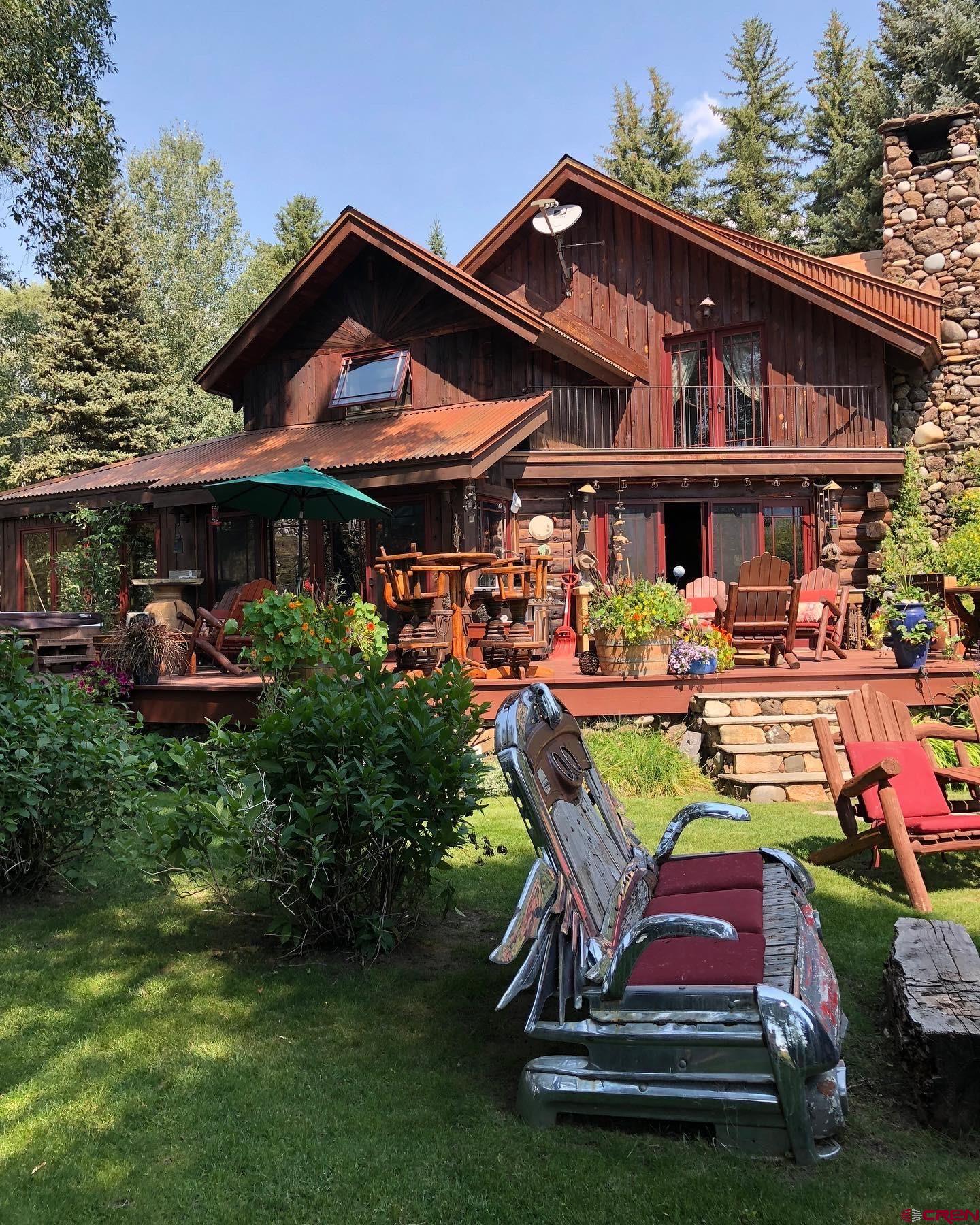 202 Lower Allen Road Crested Butte, CO 81224 - Photo 19 of 21 a view of a chairs and tables in the patio