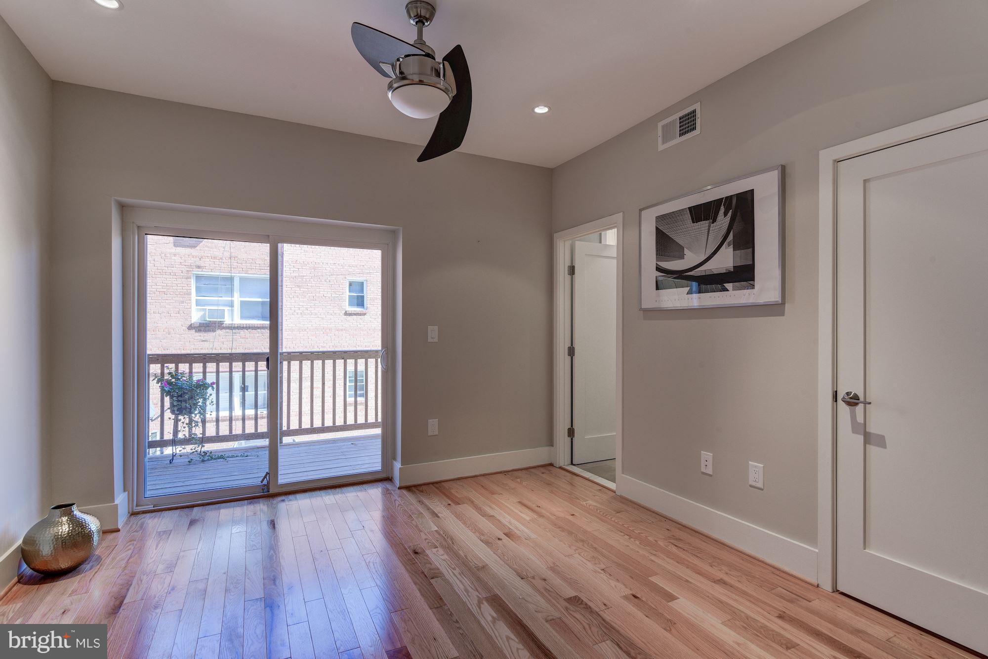 2703 11th Street Northwest, Unit 2 Washington, DC 20001 - Photo 20 of 28 Sliding glass door opens to private deck