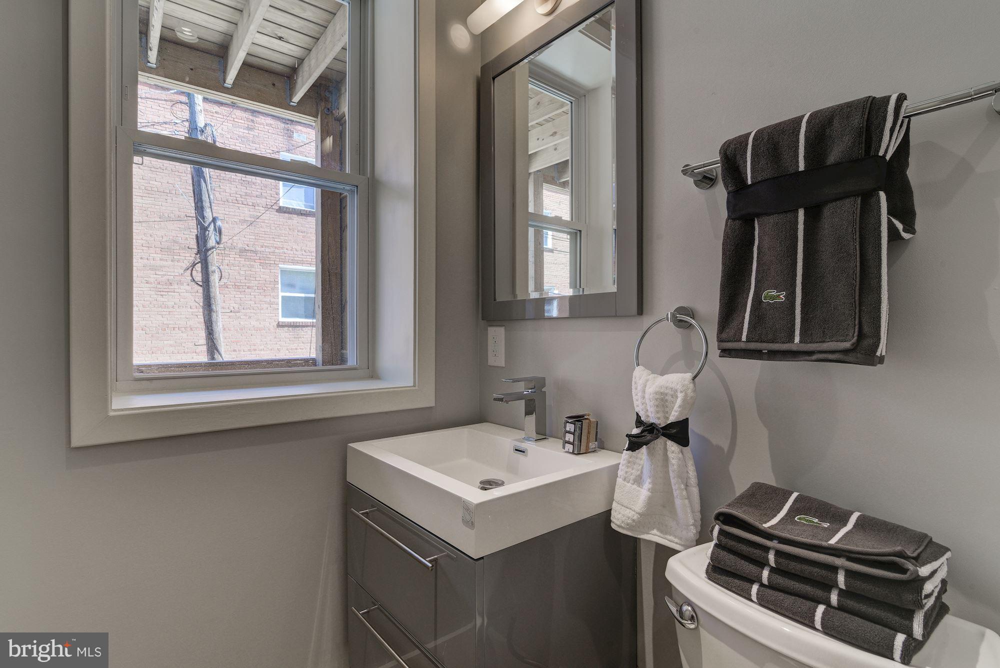 2703 11th Street Northwest, Unit 2 Washington, DC 20001 - Photo 22 of 28 Love the Floating Cabinet!