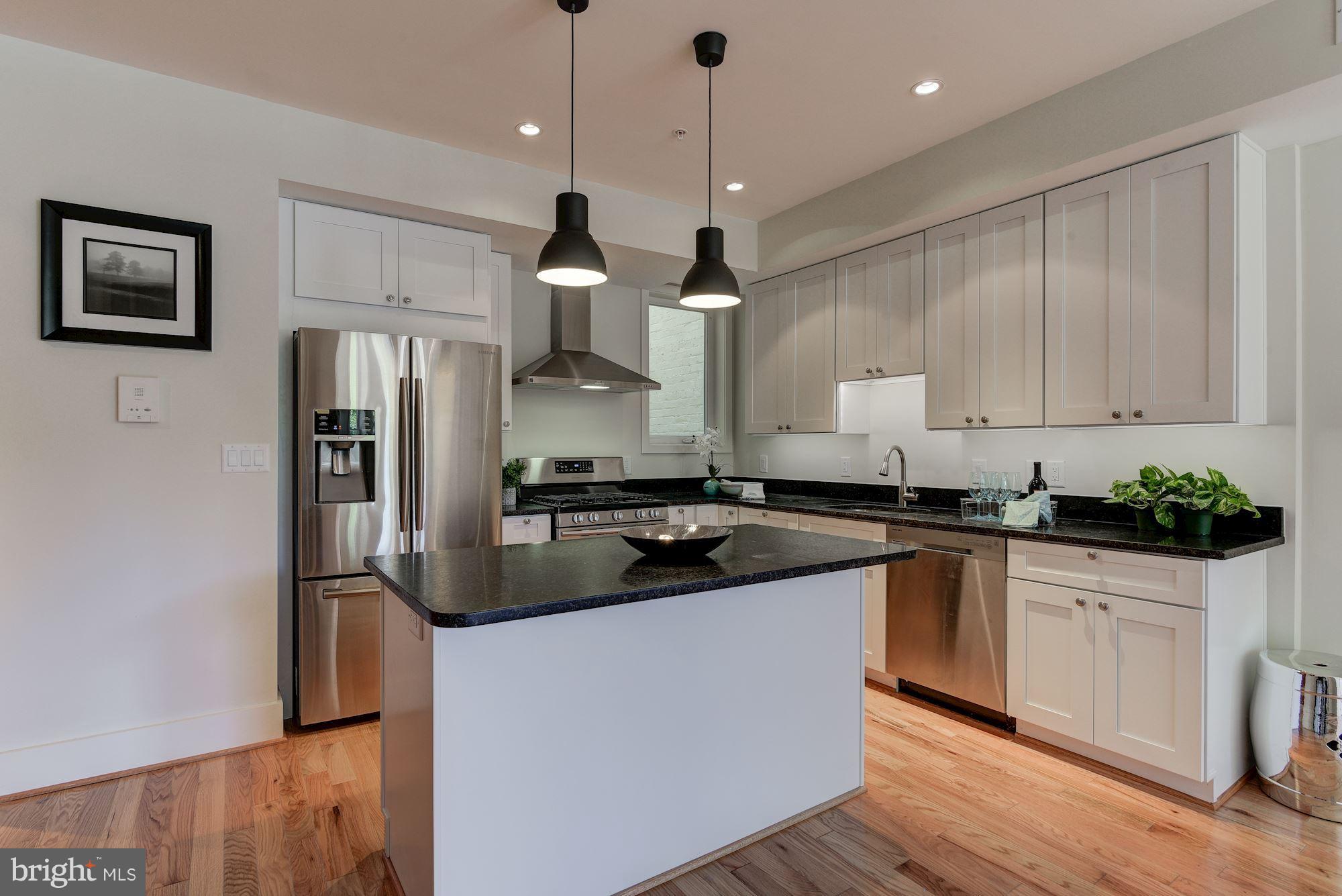 2703 11th Street Northwest, Unit 2 Washington, DC 20001 - Photo 9 of 28 Love the white and stainless steel accents