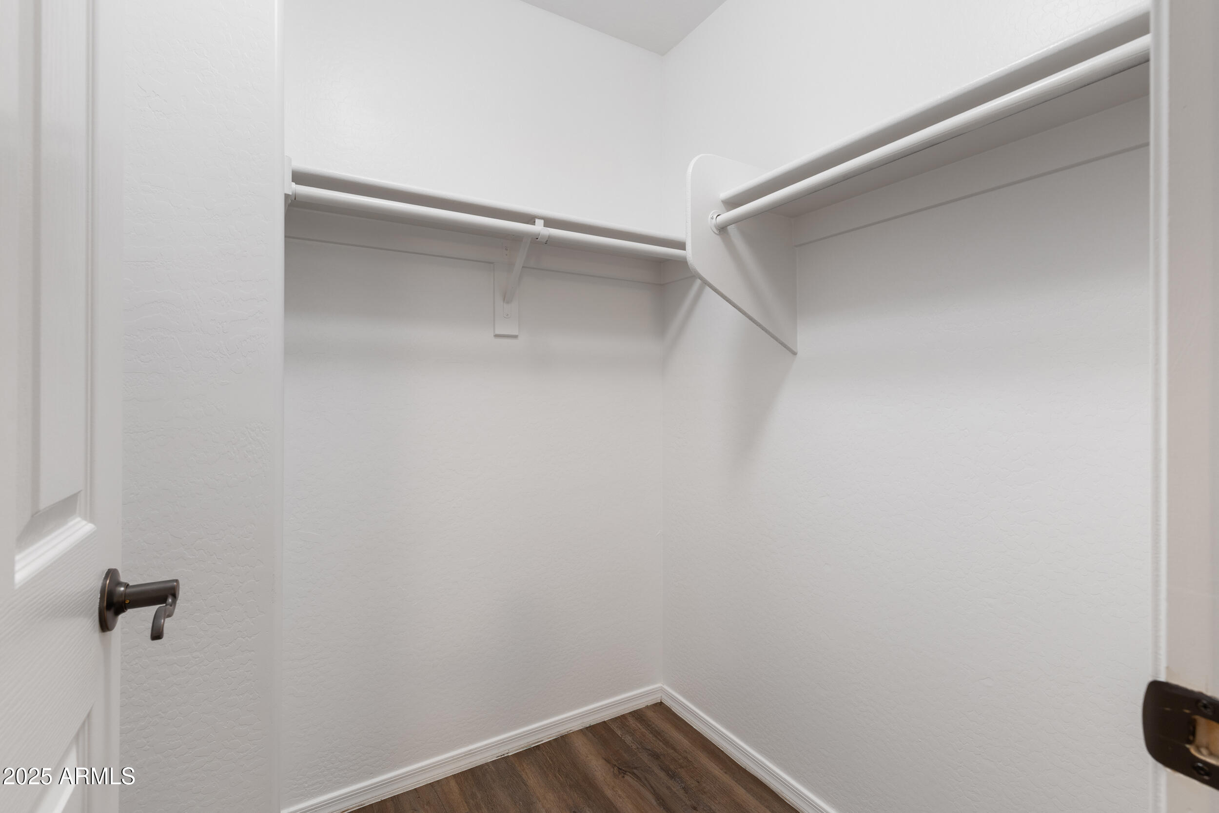 1870 South Colt Drive Gilbert, AZ 85295 - Photo 31 of 42 a view of a room with shelf on the wall