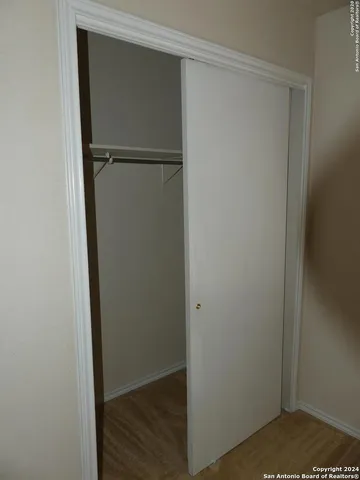 a bathroom with a sink a toilet and a shower