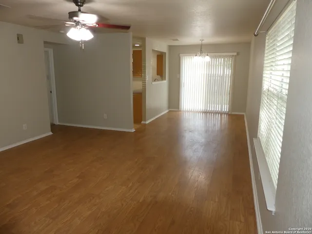 a kitchen with a sink and a window