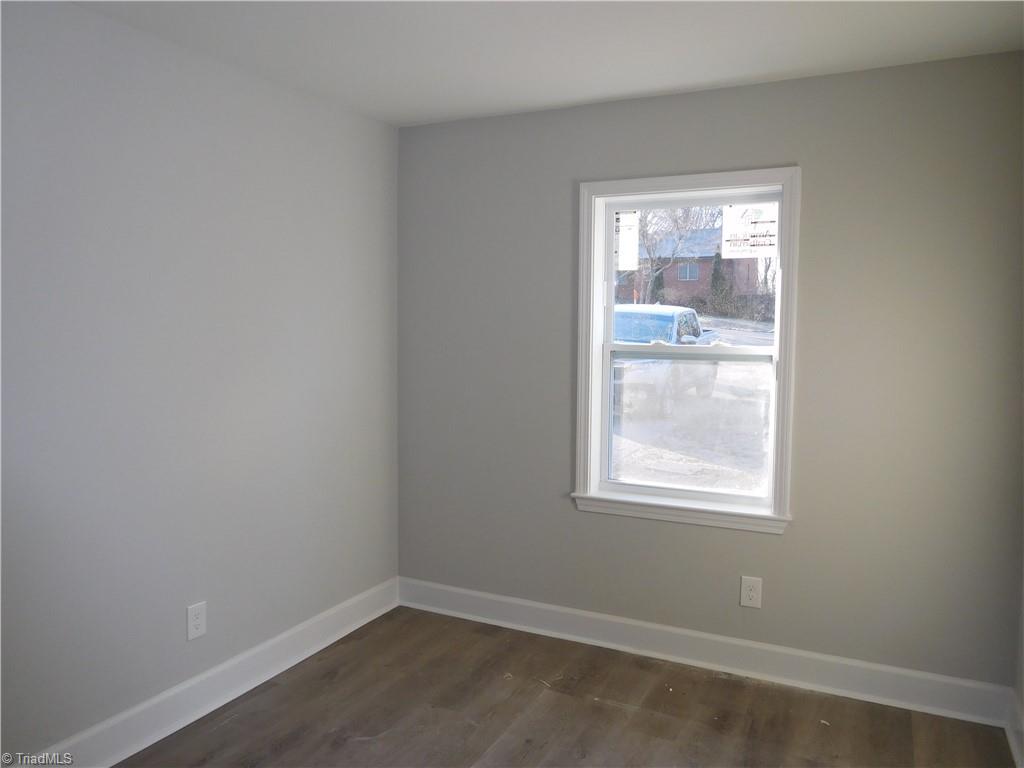 505 Motor Road Winston-Salem, NC 27105 - Photo 24 of 29 Hall Bathroom - beautiful, tiled surround. Window for more natural light.