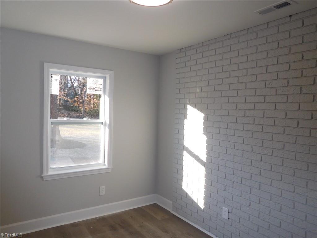 505 Motor Road Winston-Salem, NC 27105 - Photo 25 of 29 This room can be used for a number of things. Den/ Study/ Perfect Office right off the Kitchen & Garage w/ a Window. Vinyl Plank flooring.