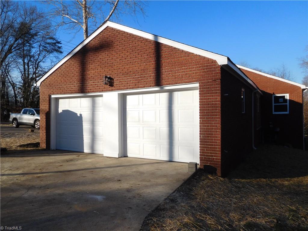 Extra Driveway added to make the turnaround much easier.  ALL NEW ROOF & WINDOWS.  Complete Remodel.  Recently Landscaped, front and back.