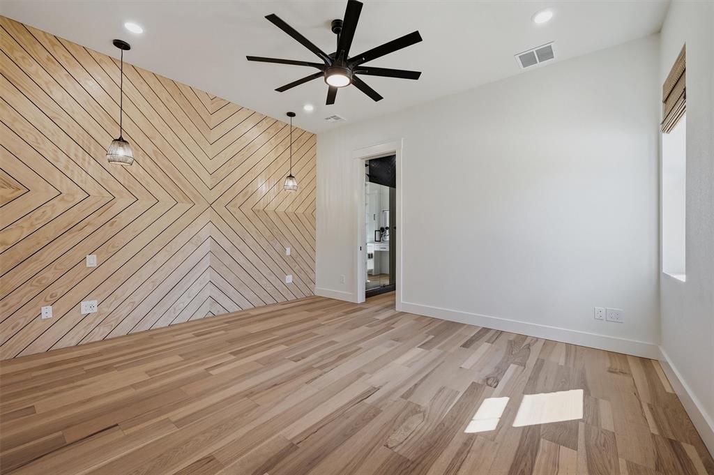 1805 Arthur Road Denison, TX 75021 - Photo 15 of 40 wooden floor in an empty room with a window
