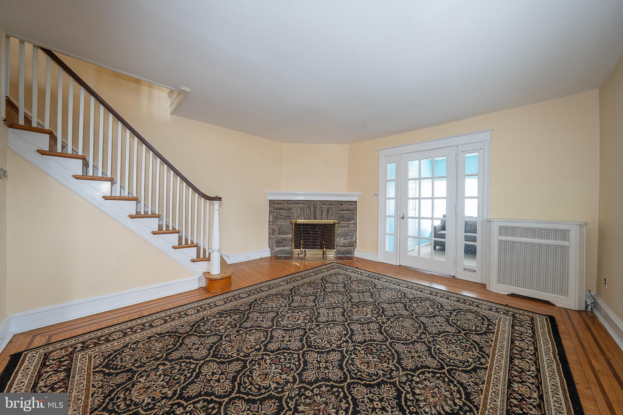 500 Elm Avenue Upper Darby, PA 19082 - Photo 11 of 35 a view of an empty room with wooden floor and a window