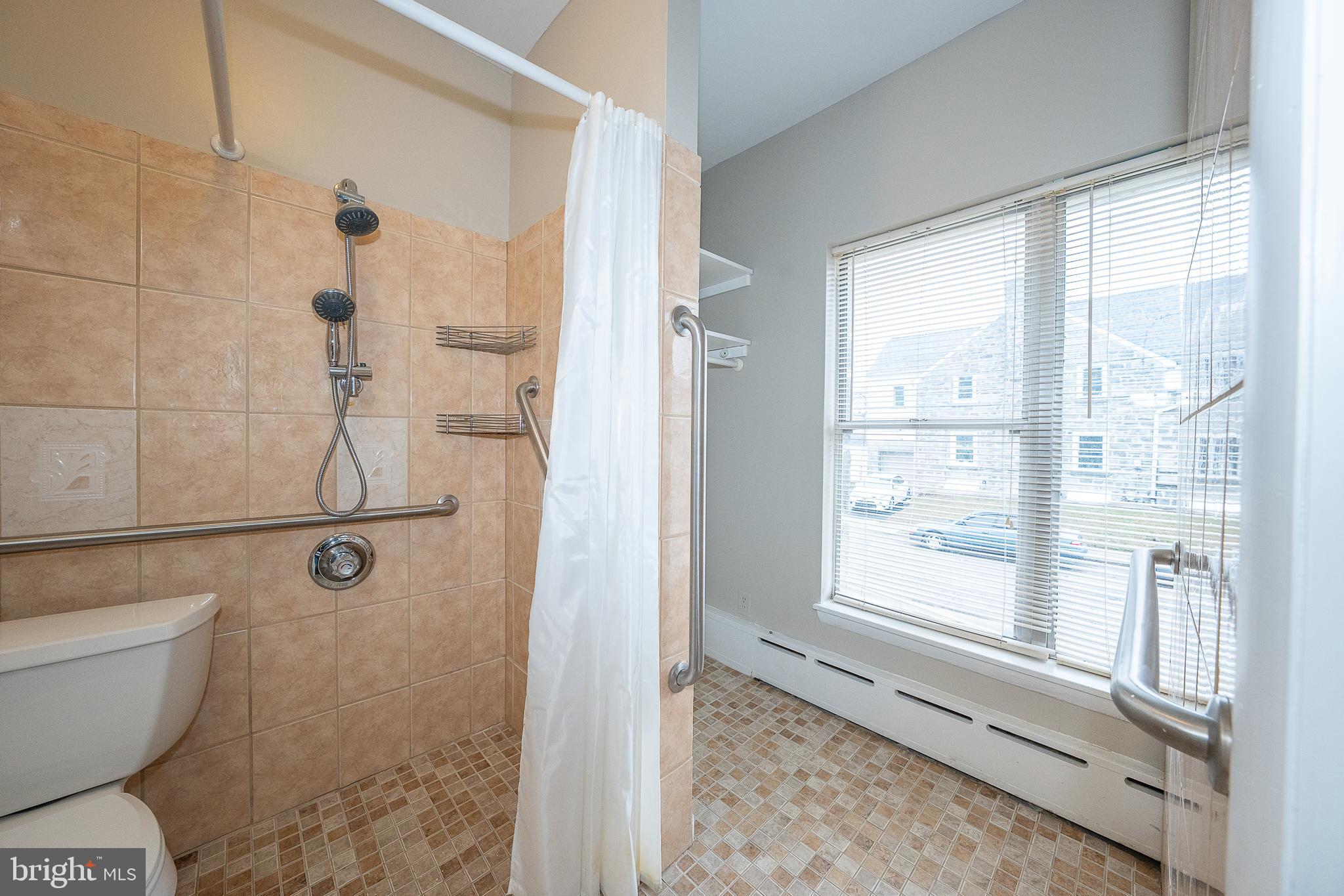 500 Elm Avenue Upper Darby, PA 19082 - Photo 16 of 35 a bathroom with a toilet tub and shower