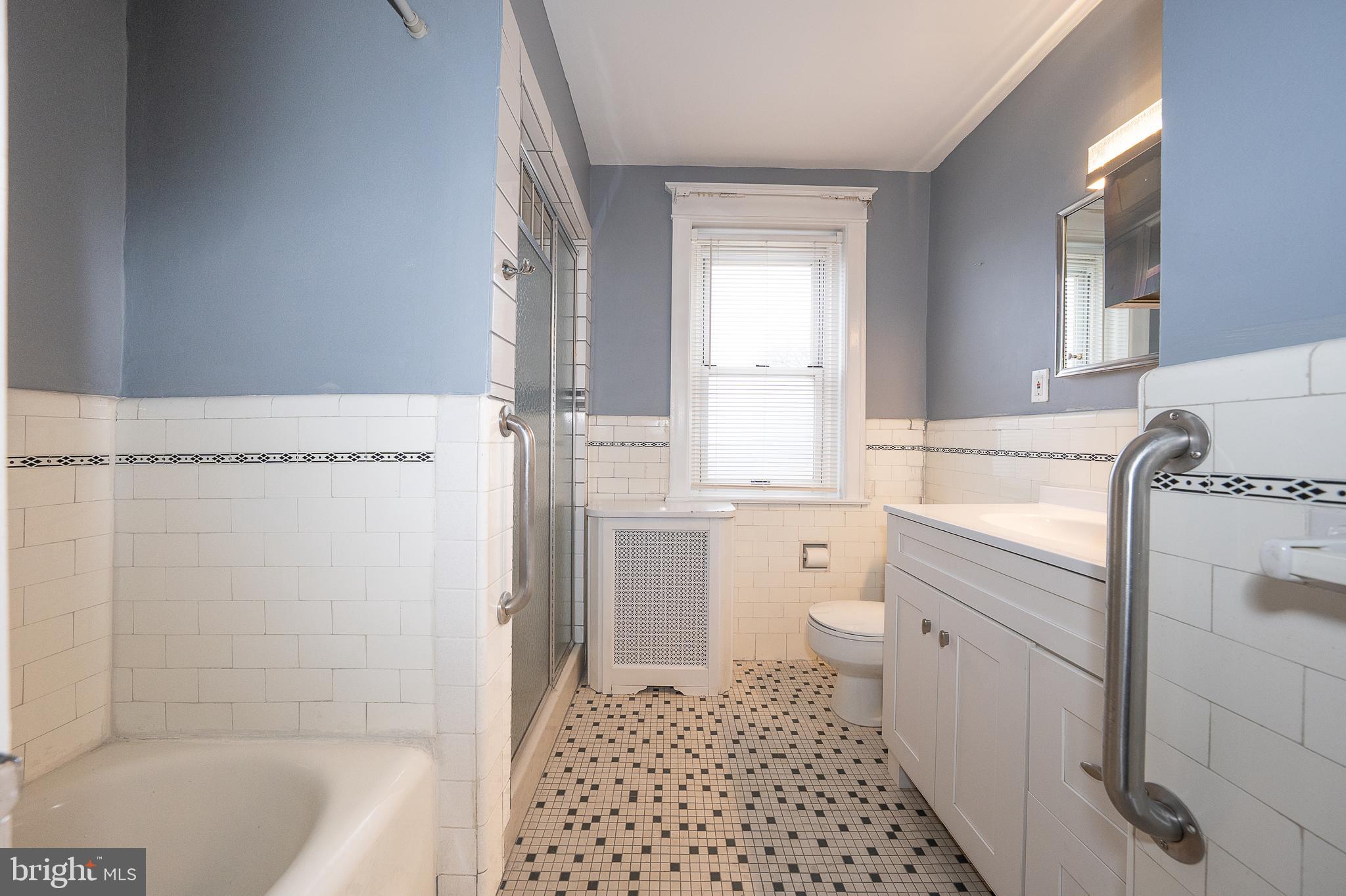 500 Elm Avenue Upper Darby, PA 19082 - Photo 21 of 35 a bathroom with a sink a toilet and window