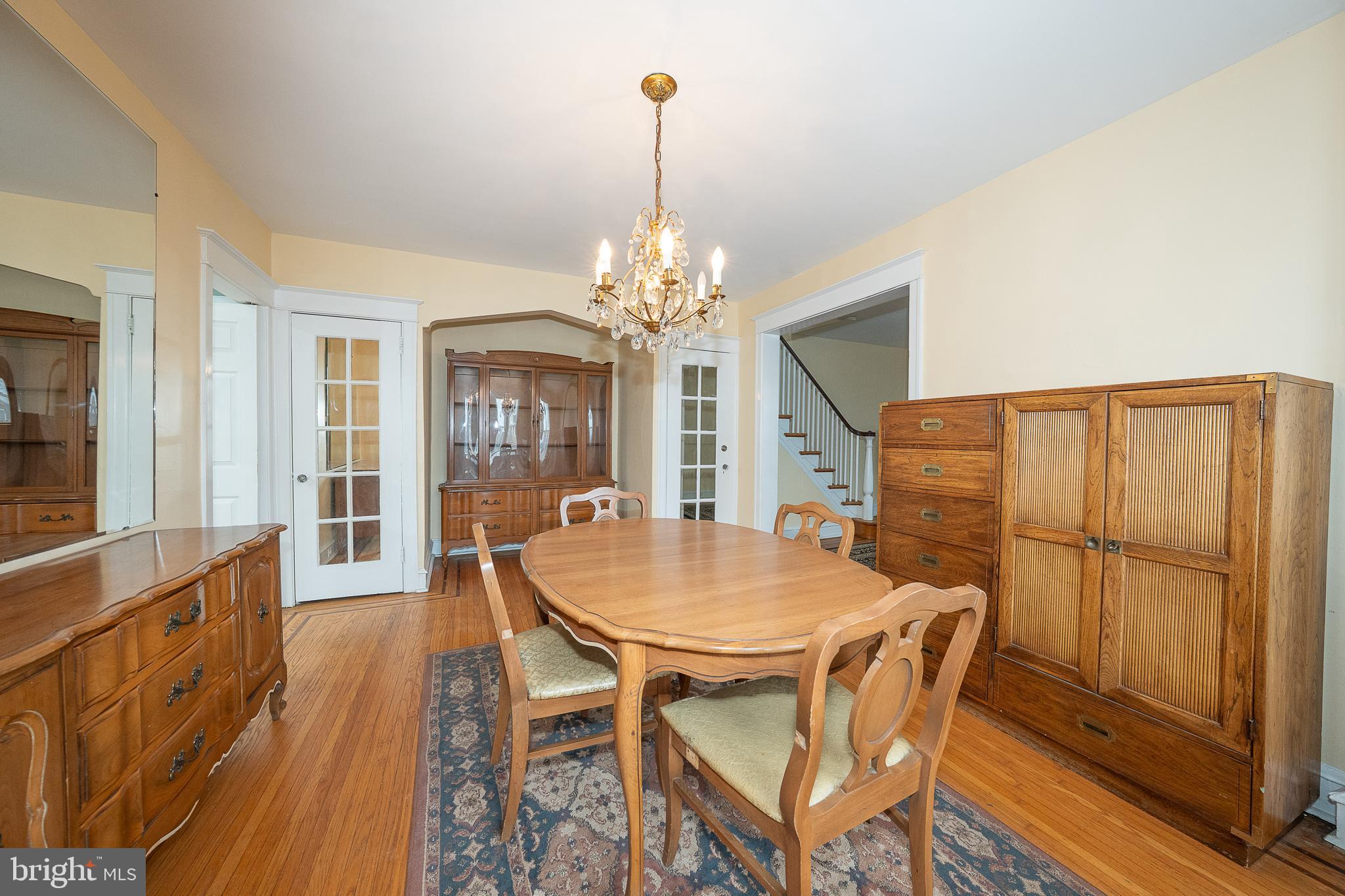 500 Elm Avenue Upper Darby, PA 19082 - Photo 7 of 35 a dining room with furniture a chandelier and wooden floor