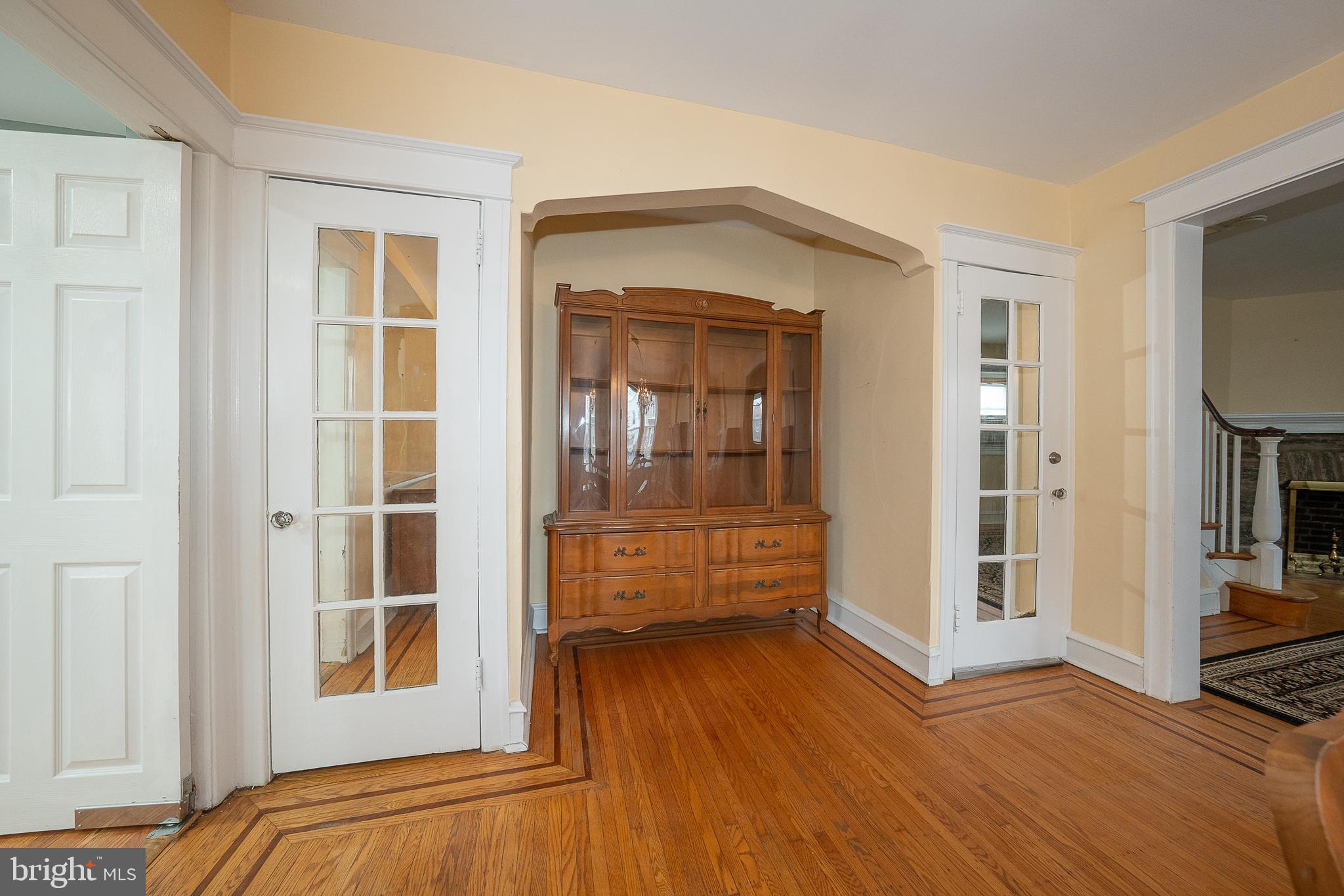 500 Elm Avenue Upper Darby, PA 19082 - Photo 9 of 35 a view of a bedroom with wooden floor and furniture
