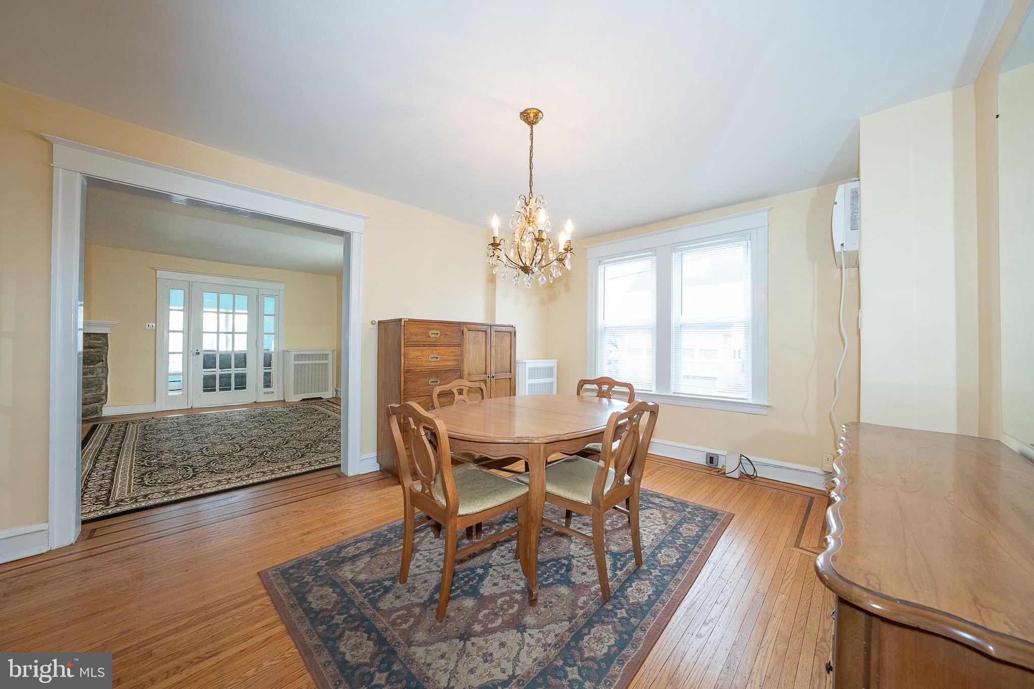 500 Elm Avenue Upper Darby, PA 19082 - Photo 10 of 35 a dining room with furniture a chandelier and wooden floor
