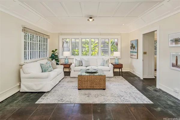 a living room with furniture and a window