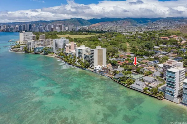 a view of a city with a lake