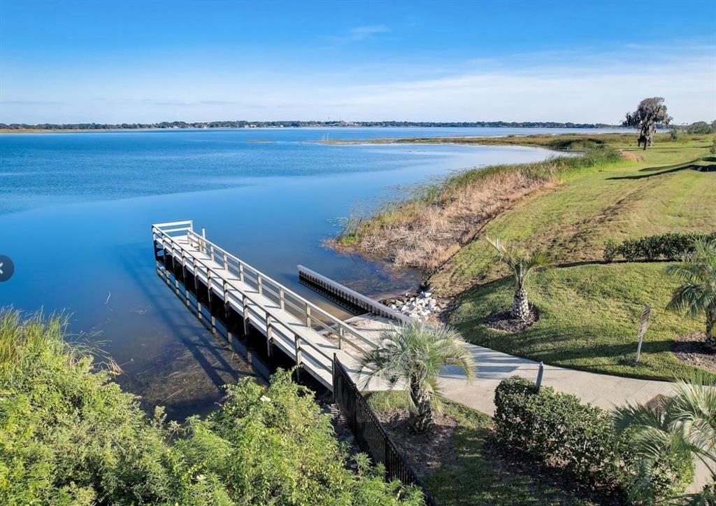 204 Valencia Ridge Drive Auburndale, FL 33823 - Photo 14 of 34 a view of a lake and outdoor space