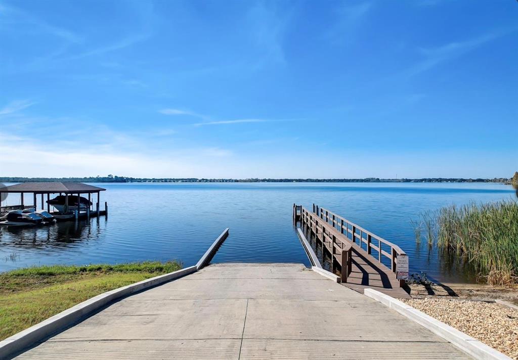 204 Valencia Ridge Drive Auburndale, FL 33823 - Photo 20 of 34 a view of swimming pool with outdoor seating and yard