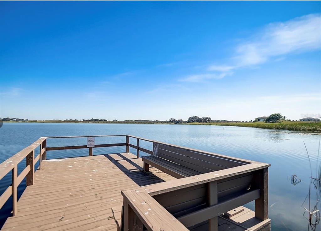 204 Valencia Ridge Drive Auburndale, FL 33823 - Photo 22 of 34 a view of a lake and outdoor space
