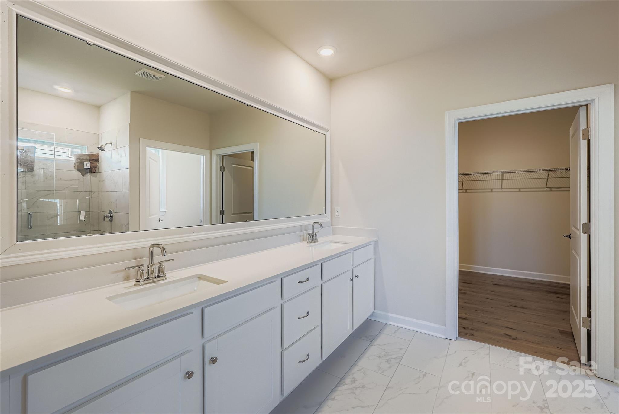 2244 Moon Crst Road Lancaster, SC 29720 - Photo 8 of 17 a spacious bathroom with double sink and a mirror