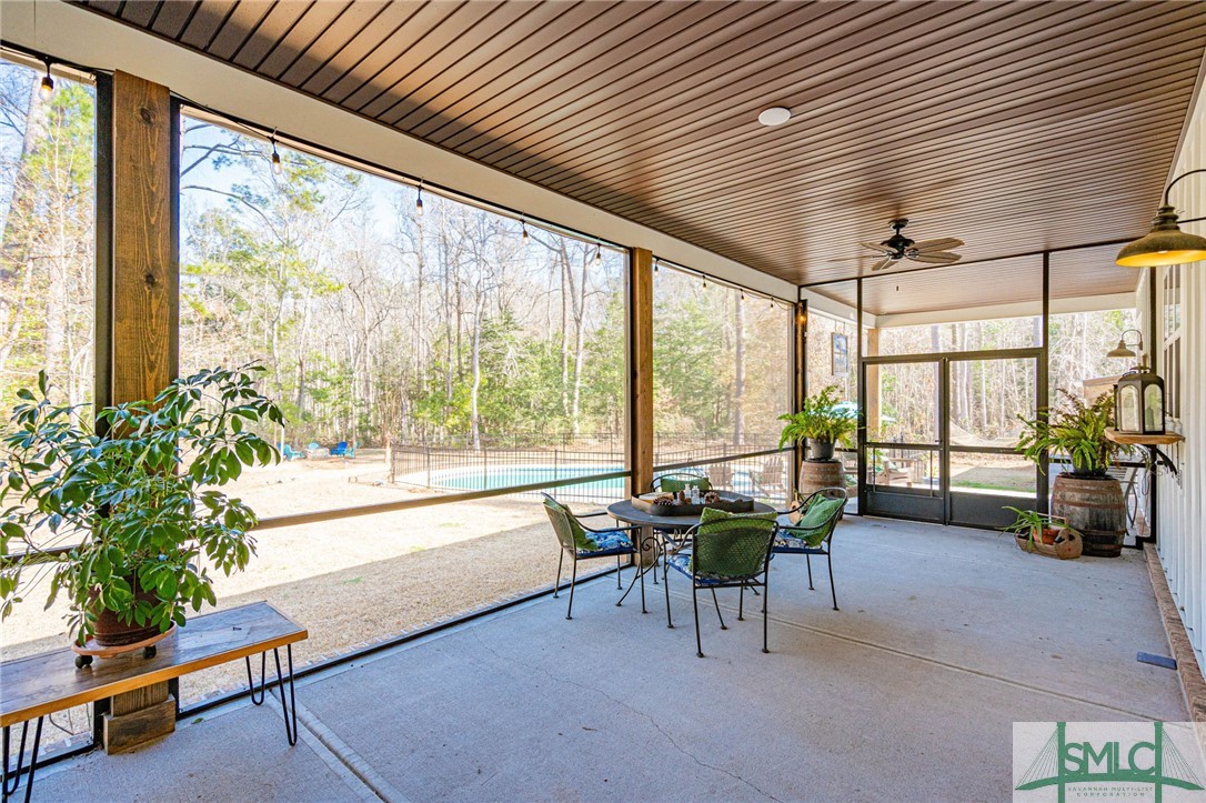 157 Ackerman Road Rincon, GA 31326 - Photo 38 of 50 Back Screened Porch from Great Room