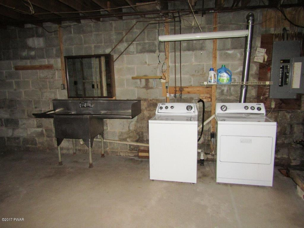 227 Hemlock Grove Road Newfoundland, PA 18445 - Photo 41 of 49 a utility room with dryer and washer
