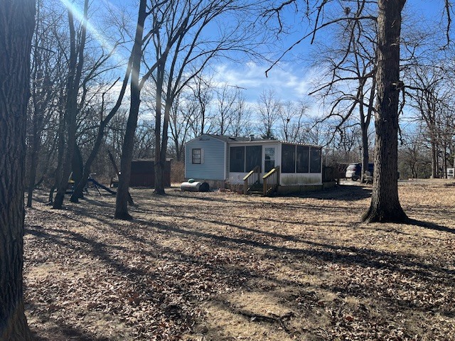 2795 East 28th Road Marseilles, IL 61341 - Photo 6 of 22 a view of a backyard with large trees