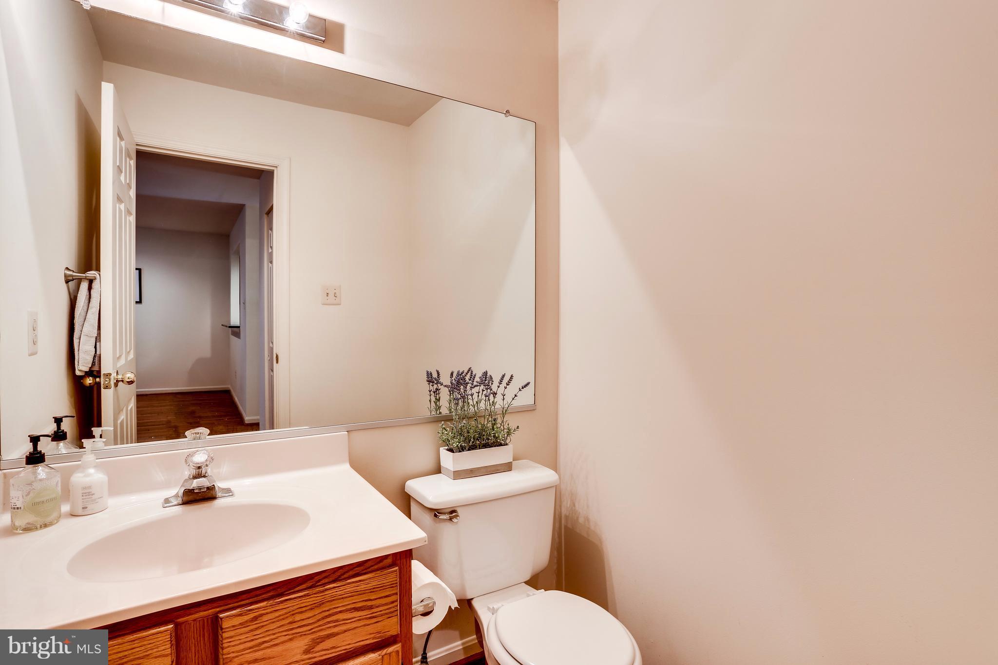 5217 Columbia Road, Unit 661 Columbia, MD 21044 - Photo 13 of 28 Bath- Main floor powder room w/hardwood floors