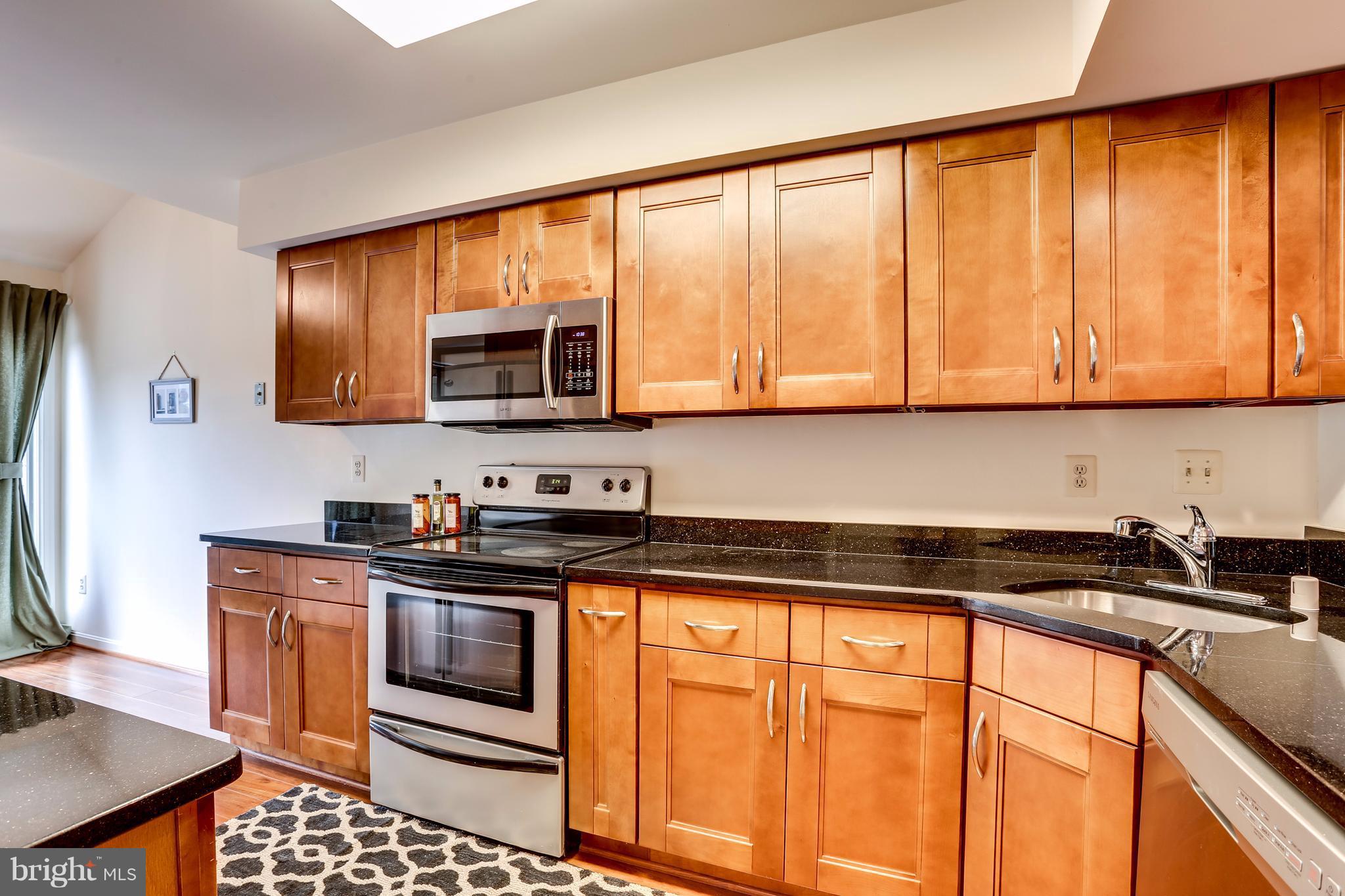 5217 Columbia Road, Unit 661 Columbia, MD 21044 - Photo 7 of 28 Kitchen-Clean looking new Cherry Cabinets