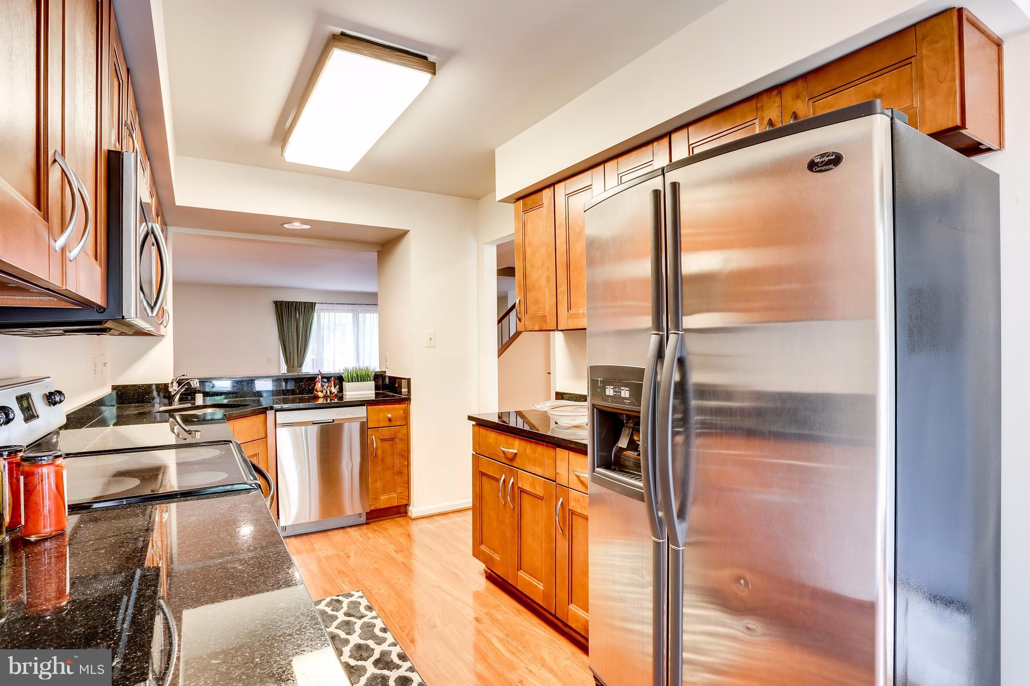 5217 Columbia Road, Unit 661 Columbia, MD 21044 - Photo 8 of 28 Kitchen-remodeled new kitchen w/SS appliances