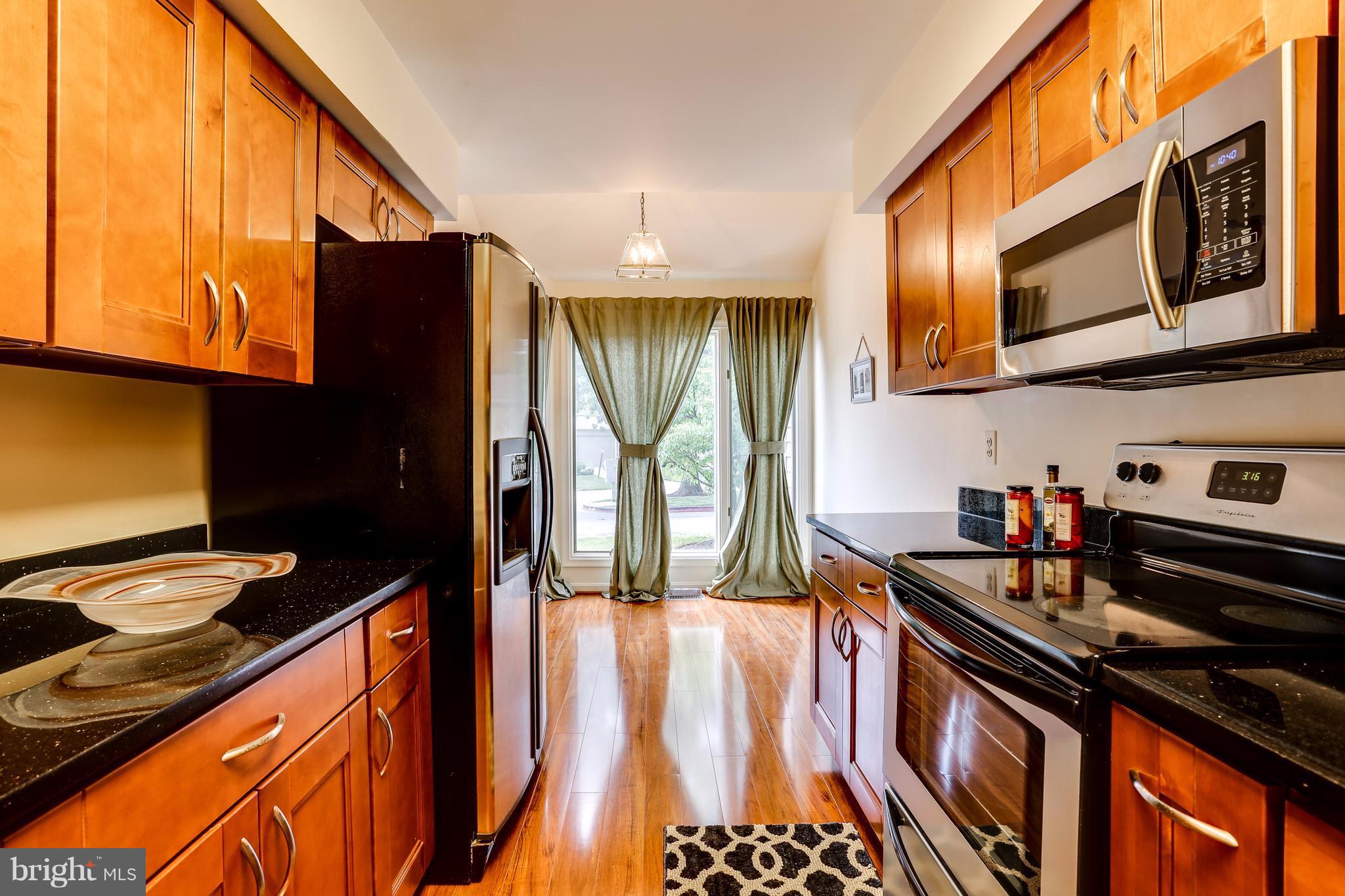 5217 Columbia Road, Unit 661 Columbia, MD 21044 - Photo 9 of 28 Kitchen- high end elegant Granite counters